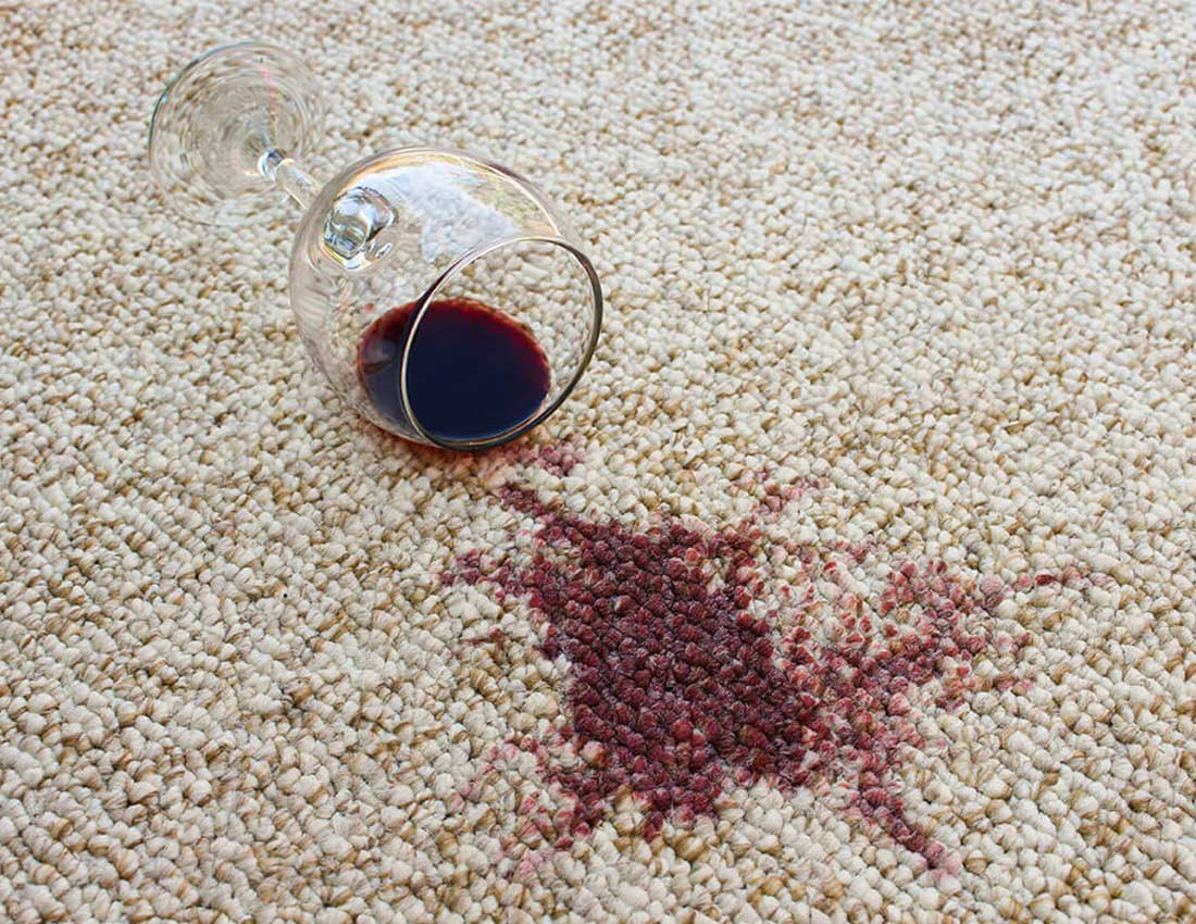 Red wine spill cleaning on carpet | All American Remnants & Rolls